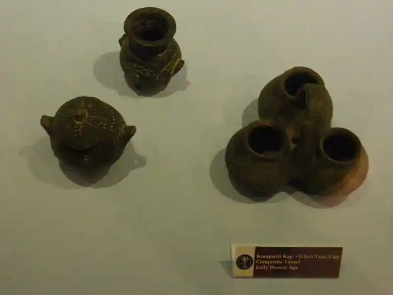 Composite vessels during the early bronze age, one of which has a solar cross design on the lid